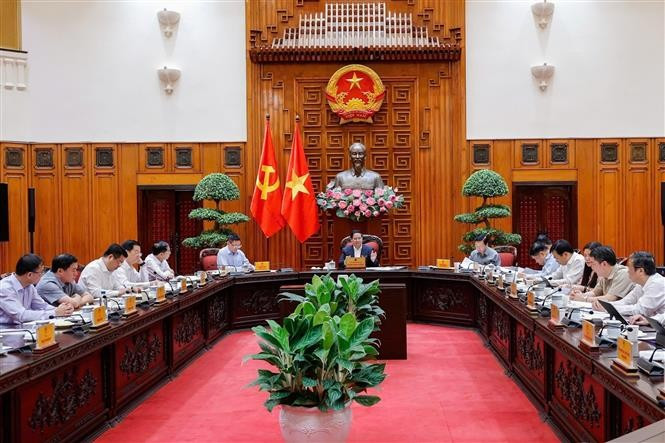 En la reunión. (Foto: VNA)