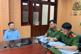 El acusado Nguyen Hoa Binh (Shark Binh) trabaja con la agencia de investigación. (Foto: Policía de Hanoi)
