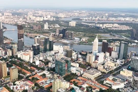 El centro de Ciudad Ho Chi Minh y la península de Thu Thiem, donde se está desarrollando el Centro Financiero Internacional. (Foto: VNA)