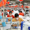 Línea de producción de prendas de vestir para exportación en Bac Ninh. (Fuente: VNA)