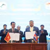 En el acto de firma del acuerdo para el estudio de inversiones en plantaciones forestales a gran escala entre Stung Treng y la empresa Phu Tai de Gia Lai. (Fuente: VNA)