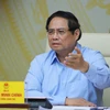 El primer ministro Pham Minh Chinh habla en el evento. (Fuente: VNA)
