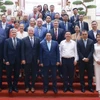 El primer ministro vietnamita Pham Minh Chinh y representantes de Consejo Empresarial Estados Unidos-ASEAN. (Fuente: VNA)