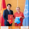 El viceministro de Relaciones Exteriores de Vietnam Le Anh Tuan y la secretaria de la CNUDMI, Anna Joubin-Bret, firmaron un Memorando de Entendimiento sobre la cooperación. (Fuente: VNA)