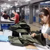 Fabricación de prendas de vestir en la compañía de confecciones TNG en la provincia de Thai Nguyen para exportación al mercado de la Unión Europea. (Fuente: VNA) 