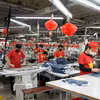 Línea de producción de prendas de vestir para exportación en Bac Ninh. (Foto: VNA)