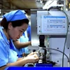 La producción de alambre semiconductor en la Zona Industrial Bo Trai. (Fuente: VNA)