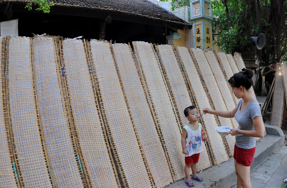 Escenas de la vida cotidiana de los habitantes locales. Foto: Viet Hung – VNA