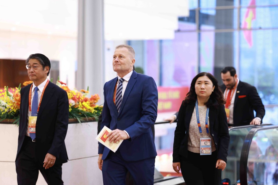 Delegados internacionales llegan a la inauguración del XIV Congreso Nacionald del Partido Comunista de Vietnam. (Foto: VNA)