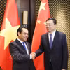 El ministro de Agricultura y Medio Ambiente de Vietnam, Trinh Viet Hung, y su par chino de Agricultura y Asuntos Rurales, Zhang Zhu. Foto: VNA