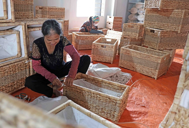 En una aldea de oficio tradicional de Hanoi. (Fuente: VNA) lang-nghe-phu-tuc.jpg