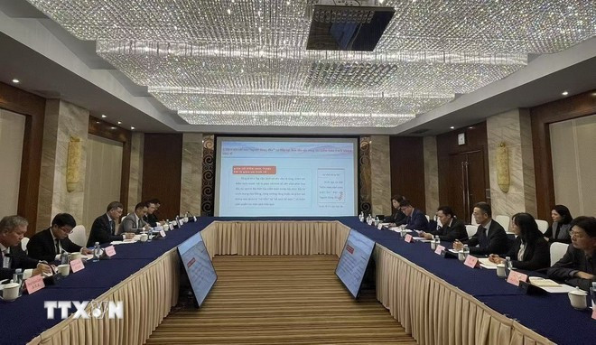 En la reunión entre el jefe de la Auditoría Estatal de Vietnam, Ngo Van Tuan, y la Oficina de Auditoría de la ciudad de Chongqing. (Fuente: VNA) trung-khanh.jpg