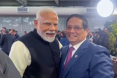 El primer ministro Pham Minh Chinh (der.) y su homólogo indio, Narendra Modi, en Río de Janeiro (Foto: Portal del Gobierno)