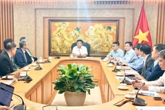Delegados en la sesión de trabajo (Foto: VNA)