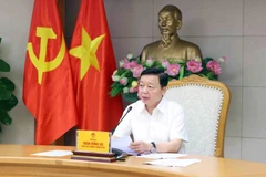 El viceprimer ministro Tran Hong Ha interviene en la reunión de trabajo. (Fuente: VNA)