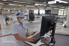 Las exportaciones de prendas de vestir contribuyen de manera importante al crecimiento. (Foto: VNA)