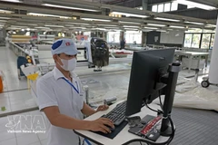 Las exportaciones de prendas de vestir contribuyen de manera importante al crecimiento. (Foto: VNA)