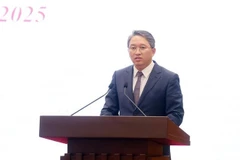 El ministro de Justicia y miembro del Comité Central del Partido, Nguyen Hai Ninh, interviene en la rueda de prensa. (Fuente: VNA)