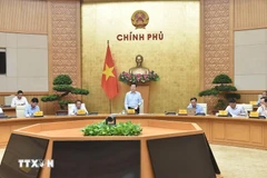 El viceprimer ministro Mai Van Chinh preside una reunión del Comité Directivo Estatal de Turismo. (Foto: VNA)