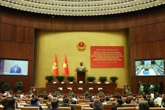 El secretario general del Partido Comunista de Vietnam, To Lam, se dirige a la conferencia nacional para difundir e implementar las Resoluciones 66-NQ/TW y 68-NQ/TW del Buró Político. (Foto: VNA)