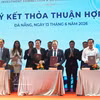 Ceremonia de firma del acuerdo de cooperación entre los socios estratégicos para el desarrollo de la Zona Franca (FTZ) de Da Nang, el 13 de junio de 2026. (Foto: VNA)