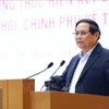 El primer ministro Pham Minh Chinh habla en la reunión. (Foto: VNA)