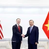 El secretario general del Partido Comunista de Vietnam, To Lam, y el representante comercial de Estados Unidos, Jamieson Greer. (Foto: VNA)
