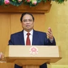 El primer ministro de Vietnam, Pham Minh Chinh, habla en la conferencia. (Foto: VNA)