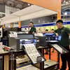 Máquinas y equipos de automatización exhibidos en la 23ª Exposición Internacional de la Industria de la Impresión y el Empaque. Foto ilustrativa: VNA