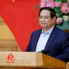 El primer ministro de Vietnam, Pham Minh Chinh, interviene en la reunión. (Foto: VNA)