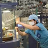Las empresas textiles y de confección se transforman de forma ecológica, cumpliendo con los altos estándares del mercado. (Foto: PV/Vietnam+)