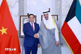 El primer ministro Pham Minh Chinh se reúne con su homólogo de Kuwait, el jeque Ahmad Abdullah Al-Ahmad Al Sabah. (Foto: VNA)