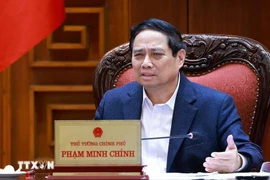 El primer ministro Pham Minh Chinh habla en la reunión. (Fuente: VNA)