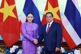 El primer ministro vietnamita, Pham Minh Chinh, y su homóloga tailandesa, Paetongtarn Shinawatra. (Fuente: VNA)