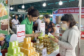 Clientes compran en el Centro MM Mega Market Thang Long. (Foto: hanoimoi.vn)