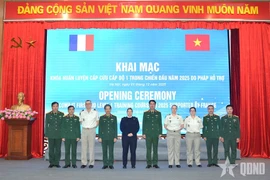 Delegados en el evento. (Fuente: QDND.VN)