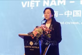 Yang Yanyan, presidenta de la Asociación de Promoción Comercial de Guangxi, China, habla en el evento. (Fuente: VNA)