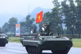 Fuerzas blindadas en el cuarto ensayo. (Foto: VNA)