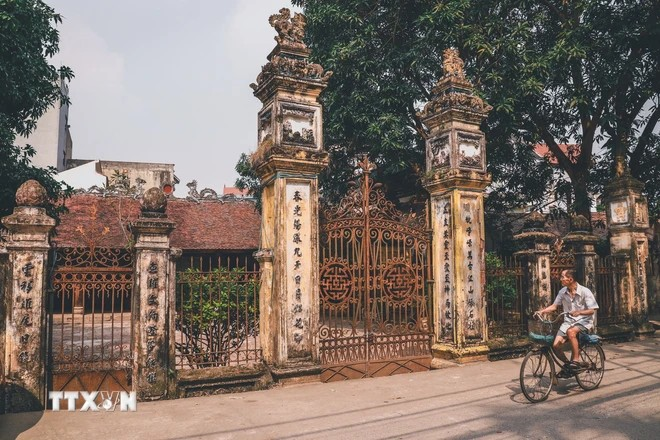 La casa comunal de la aldea de Cu Da (Dinh Vat) es un lugar famoso por su belleza antigua e idílica. (Foto: VNA)