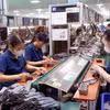 En la primera quincena de agosto, las exportaciones de ordenadores, productos electrónicos y componentes alcanzaron 7,32 mil millones de dólares. (Foto: VNA)