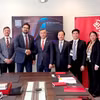 Funcionarios del Ministerio de Finanzas de Vietnam se reúnen con representantes del FinDev Canada. (Foto: nhandan.vn)