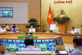 El primer ministro de Vietnam, Le Minh Hung, interviene en la cita. (Foto: VNA)