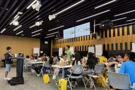 Niños asisten al evento en la Oficina de Google en Singapur. (Foto: VNA)