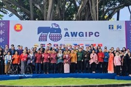 Delegados participantes en el encuentro (Foto: VNA)