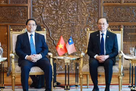 El primer ministro de Vietnam, Pham Minh Chinh (izquierda), y su homólogo de Malasia, Anwar Ibrahim (Foto: VNA)