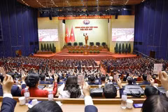 El XIV Congreso aprueba la lista de candidatos para el Comité Central. Foto: VNA