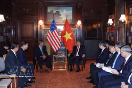 El secretario general del Partido Comunista y presidente de Vietnam, To Lam, recibe a Thomas R. Hardy, director interino de la USTDA (Fuente: VNA)