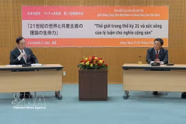 Nguyen Xuan Thang, presidente del Consejo Teórico Central de Vietnam, y Shii Kazuo, presidente del Comité Ejecutivo Central del Partido Comunista de Japón, en su reunión. Foto: