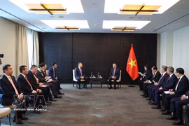 El secretario general del Partido Comunista de Vietnam y presidente del país, To Lam, se reúne con director general de Zarubezhneft JSC, Serguéi Kudryashov (Fuente: VNA)