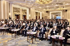 Delegados y representantes empresariales de ambos países asistieron a la conferencia. Foto: VNA